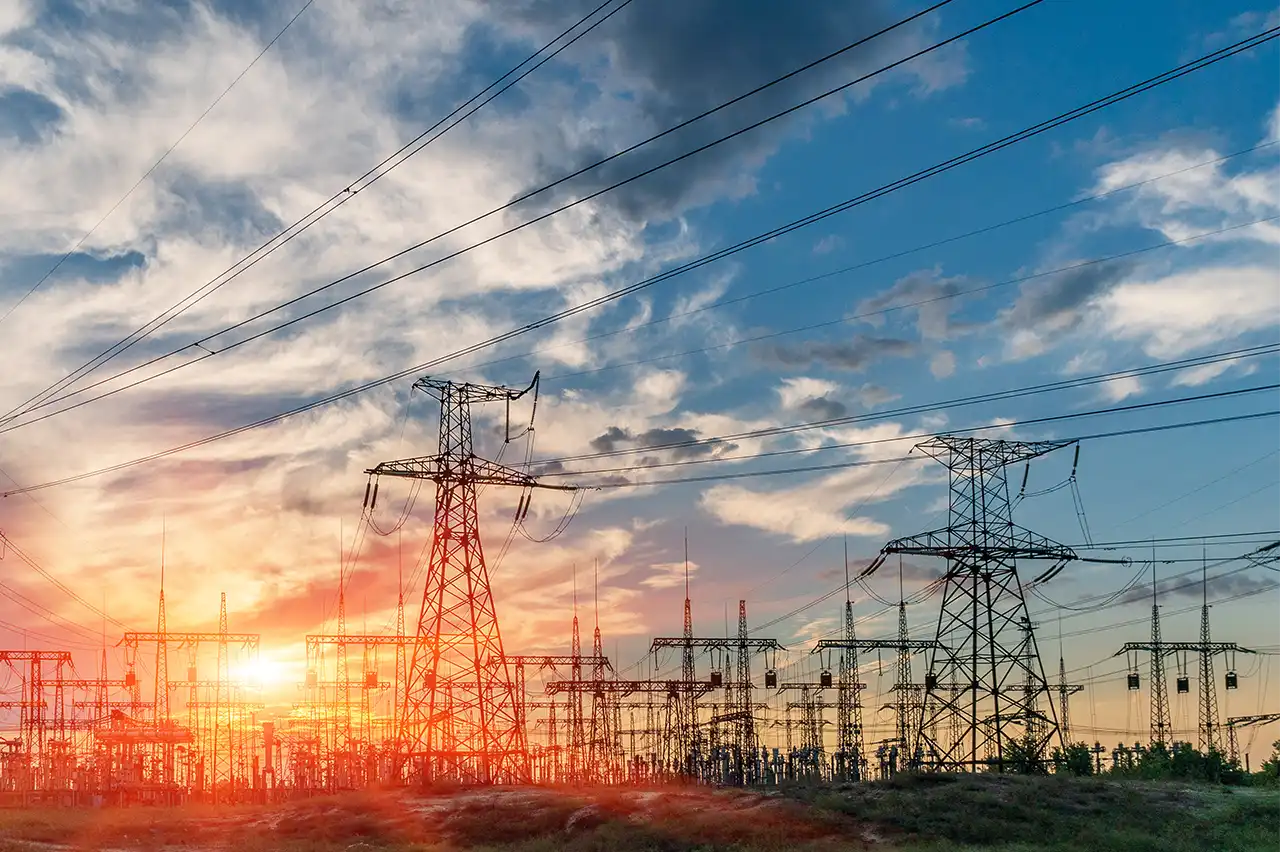U.S. electric transmission lines and substations at sunset